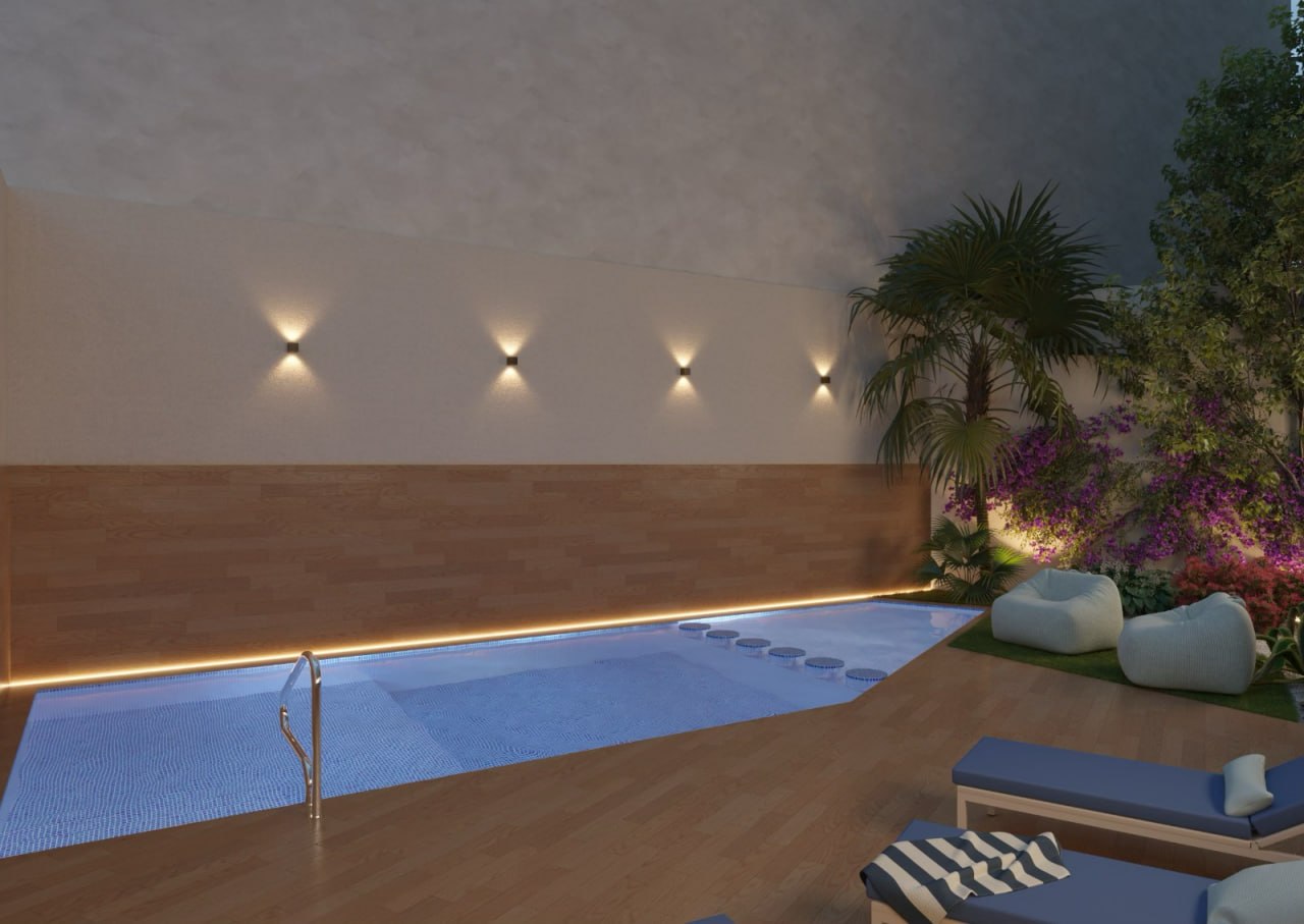 Piscina comunitaria al atardecer con cubierta de madera — Prim 3